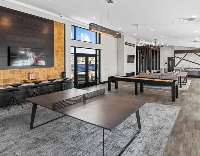 Clubhouse interior featuring a ping pong table