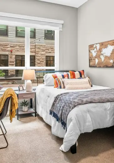 a furnished apartment bedroom